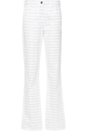 GENNY Vaqueros rectos con apliques de strass