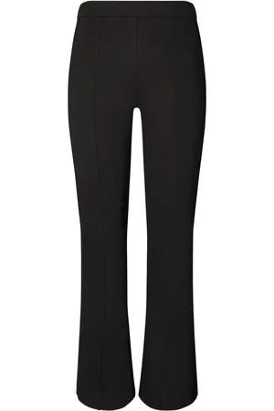 Tory Burch Pantalones de compresión capri acampanados