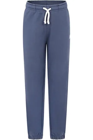 New Balance Pantalones de chándal con bajos elásticos