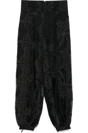 Taakk Pantalones con motivo estampado