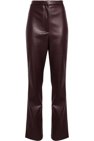 ROTATE Pantalones slim de talle alto