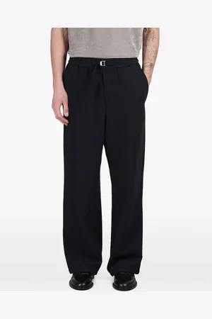 Ami Pantalones con hebilla del logo