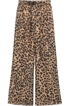 Tom Ford Pantalones con estampado de leopardo