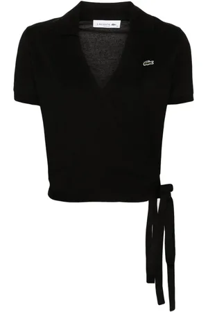 Lacoste Polo con parche del logo