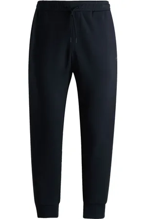 HUGO BOSS Pantalones joggers con capucha y cremallera
