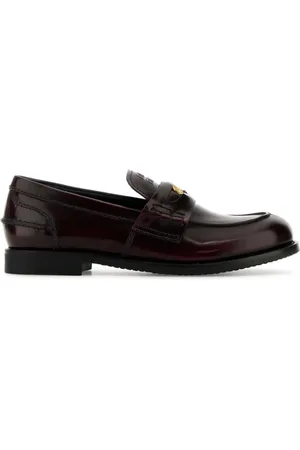 Miu Miu Mocasines penny con diseño entretejido