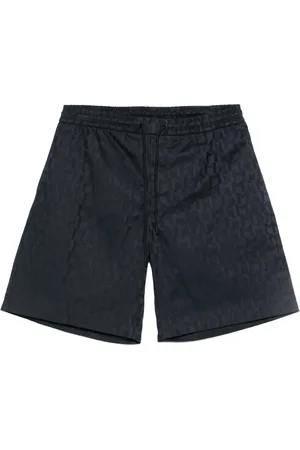 Moncler Pantalones cortos con monograma en jacquard