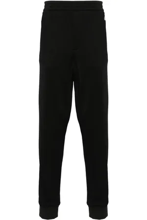 Alexander McQueen Pantalones de chándal con logo bordado