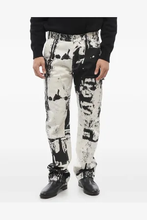 Alexander McQueen Vaqueros con calavera estampada