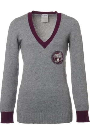 CHANEL Jersey con detalle de distintivo