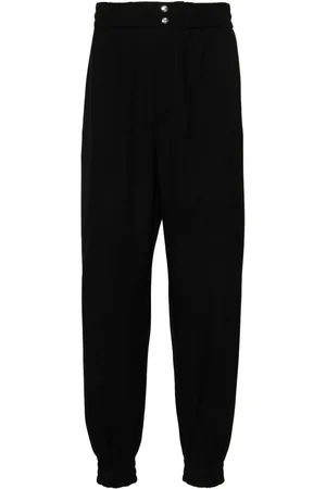 Alexander McQueen Pantalones con cierre de botón