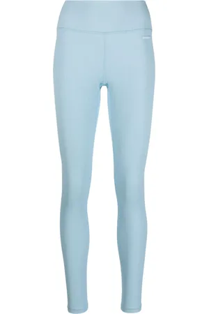 Sporty & Rich Leggins Serif con parche del logo