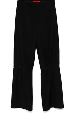 Kusikohc Pantalones con remaches