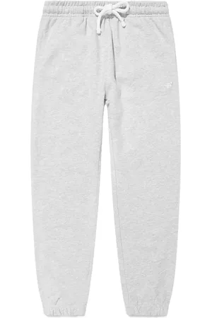 New Balance Pantalones de chándal con logo bordado