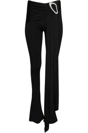DAVID KOMA Pantalones con sobrecapa