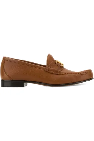 VALENTINO GARAVANI Mocasines penny de piel con Vlogo