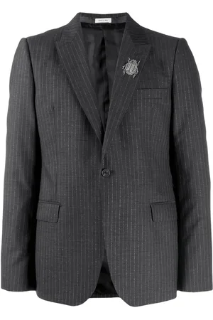 Alexander McQueen Blazer a rayas diplomáticas con detalle de insecto