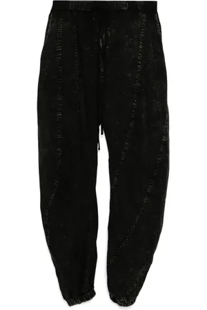 JULIUS Pantalones Hellion con diseño curvo