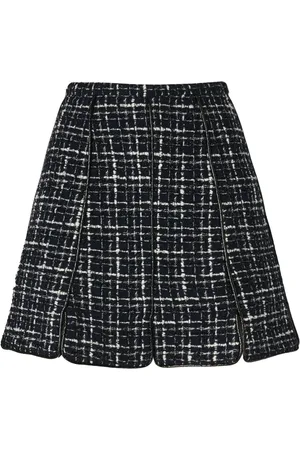 GENNY Falda corta con paneles de tweed