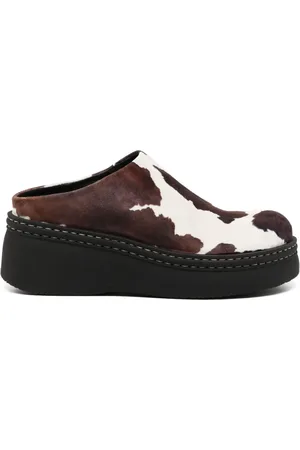 Miista Mules Kristi con vaca estampada