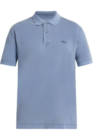 Lacoste Polo con parche del logo