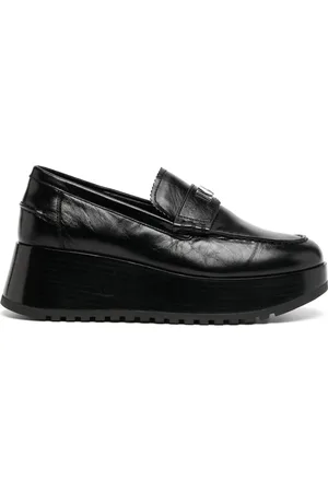 Michael Kors Mocasines Indy con acabado bruñido