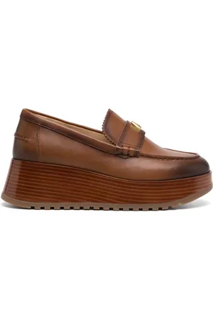 Michael Kors Mocasines Indy con acabado bruñido
