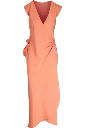 Domínguez Usa Vestido Adolfo Dominguez Asimétrico Naranja Manga