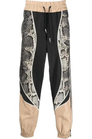 Roberto Cavalli Pantalones de chándal con estampado de serpiente