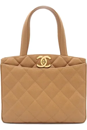 CHANEL Bolso de mano acolchado de cuero caviar con cierre giratorio y logo CC 1994-1996