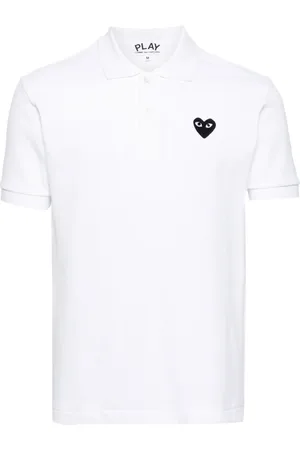 Comme des Garçons Polo con parche de corazón