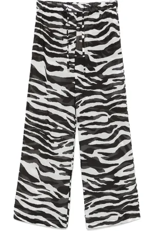 The Attico Pantalones translúcidos con estampado de cebra