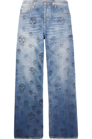 Alexander McQueen Vaqueros con calavera estampada