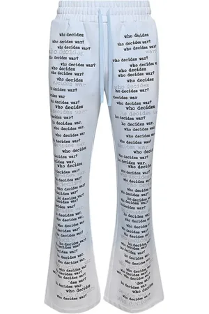Who Decides War Pantalones acampanados con texto estampado