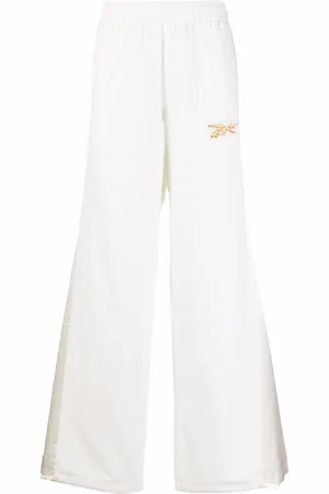 Reebok Pantalones anchos con detalle de parches
