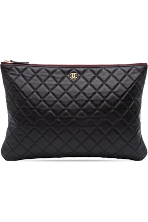 CHANEL Bolso de mano O Case grande con diseño acolchado de piel de borrego 2019