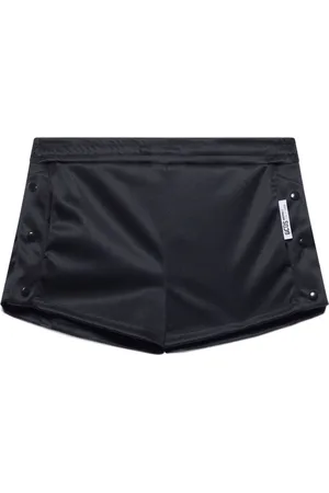 GCDS Bermudas con etiqueta del logo