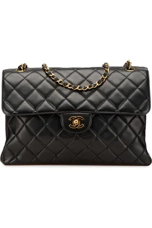 CHANEL Bolso de hombro Jumbo con doble solapa lateral en piel de borrego 1996-1997