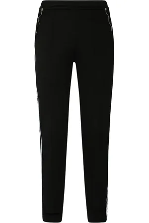 Givenchy Pantalones de chándal con franja del logo