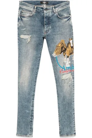 AMIRI Vaqueros con pegaso estampado