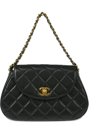 CHANEL Bolso de mano con cadena de piel de borrego 1995