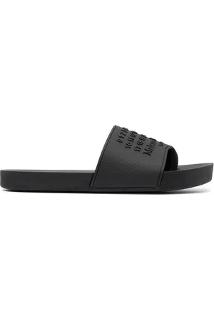 Maison Margiela Sandalias Tabi con logo en relieve
