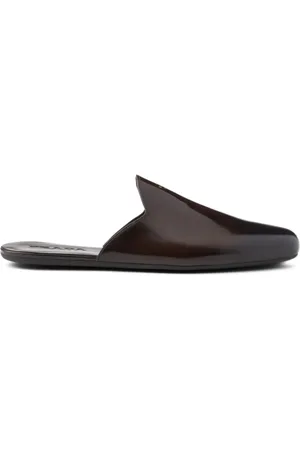 Prada Mules con efecto cepillado