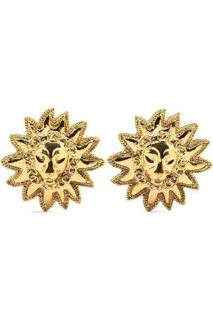 CHANEL Pendientes de clip con logo CC bañados en oro con detalle de león 1970-1980