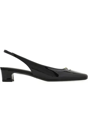 Salvatore Ferragamo Delightfully unassuming, this demure slingback features an elegant squared tip with a small rectangular cut out that is placed in front o...