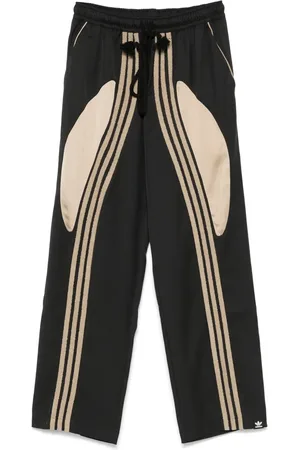 SONG FOR THE MUTE Pantalones tejidos de x adidas