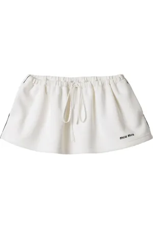 Miu Miu Minifalda de algodón y tejido jersey