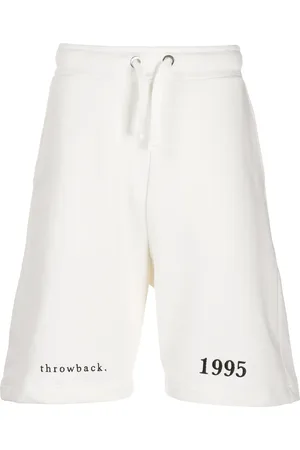 Throwback. Pantalones cortos de deporte con logo bordado
