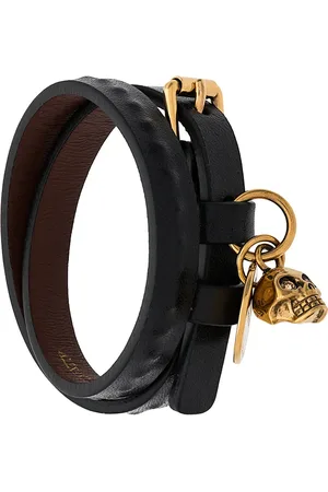 Alexander McQueen Pulsera con doble diseño cruzado
