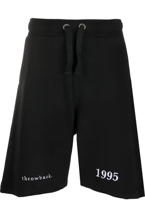 Throwback. Pantalones cortos de deporte con logo bordado
